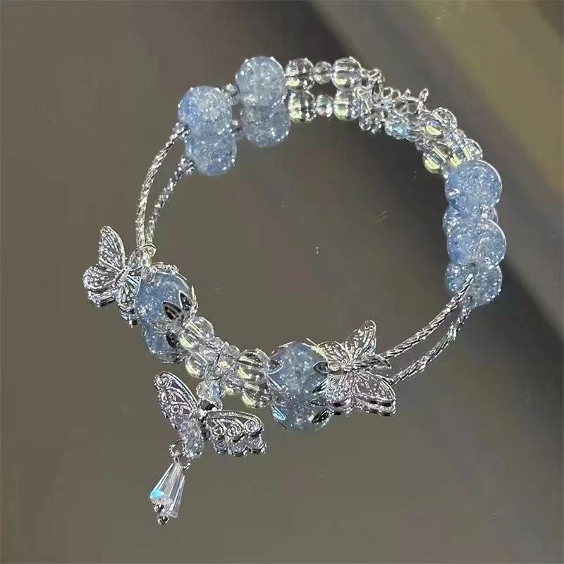 Pulsera mariposa floral azul