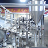 Machine de remplissage électrique automatique haute précision pour liquides, crèmes, pâtes et gels, en acier inoxydable SUS304, contrôlée par PLC avec volume réglable