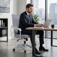 Chaise de bureau ergonomique en maille réglable en hauteur avec support lombaire pour le gaming et le bureau (vente en gros)