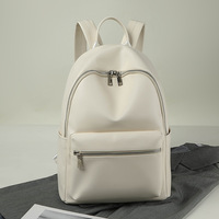 Sac à dos étudiant léger à la mode Fermeture à glissière Doublure en polyester Imperméable PU Logo personnalisé pour les voyages scolaires