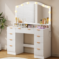 Coiffeuse avec miroir LED à arche pour chambre principale élégante, avec tiroirs de rangement