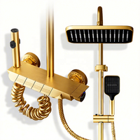 Ensemble de douche mural multifonctionnel de luxe moderne doré avec pommeau de douche piano à jet pluie et robinet en céramique pour appartement
