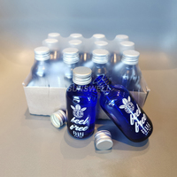Machine automatique de remplissage, d'étiquetage et d'emballage de bouteilles en verre pour boissons gazeuses, eau gazeuse, eau pure et eau tonique