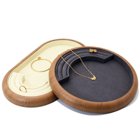 MC DLTP004 Nouveau plateau de présentation de bijoux rond et ovale en cuir PU gris foncé et beige pour boucles d'oreilles, bagues ultra-fines et bracelets