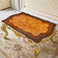Table à manger sculptée de style français de luxe, ensemble de table et de chaises de style européen haut de gamme pour les restaurants et l'usage domestique.