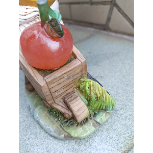 Statue de gnome <span class=keywords><strong>elfe</strong></span> sans visage en résine pour l'extérieur poussant le chariot avec lumière solaire orange pour la décoration de figurines de jardin de noël - Product Image 5