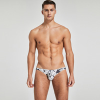 Sous-vêtements pour hommes, caleçons string taille basse avec logo imprimé sur la ceinture, en soie glacée tricotée, polyester antibactérien, grandes tailles