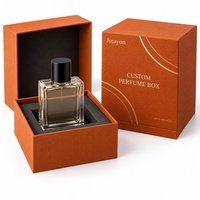 Boîte à parfum rigide verticale en papier spécial gaufré textile fin avec logo personnalisé orange, insert en mousse surélevé, finition brillante, 10x10x14cm