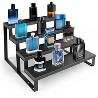 Rak Display Parfum Hitam Empat Tingkat dengan Rangka Besi Penyangga, Organizer Cologne untuk Pria
