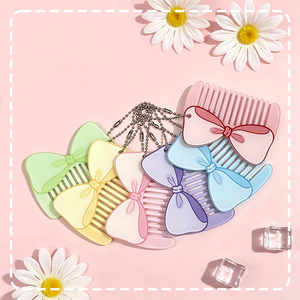 Juego de peines de plástico con lazo en colores pastel, duraderos, portátiles, de bolsillo, con cadena, para uso diario, al por mayor - Product Image 1