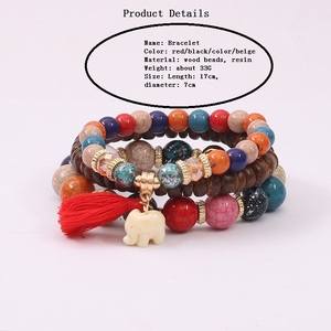 Trendz Simple y seguro bebé elefante con flecos de madera del grano elástico pulsera de niños - Product Image 2