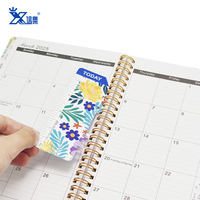 Venta caliente a granel doble bobina de metal planificador diario cuadernos A5 papel personalizado impresión Tapa dura cuaderno espiral con regla