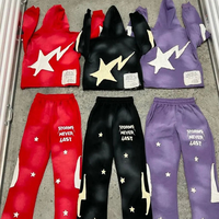 Ensemble de survêtement unisexe délavé à l'acide avec sweat à capuche zippé et pantalon évasé effet vieilli et patchs