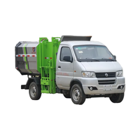 Mini camion à ordures compacteur diesel à chargement latéral avec crochet latéral, boîte de vitesses manuelle, transmission 4x2, pompe pour bacs de 120L/240L