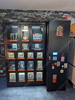 Máquina expendedora combinada de casillero inteligente biométrico y RFID con acceso seguro y ventas Acepta pagos con código QR de moneda de tarjeta de crédito