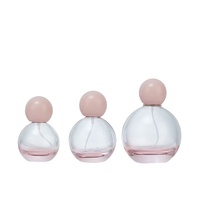 Flacon pulvérisateur de parfum en verre sphérique rose de luxe avec bouchon à bille 30ml 50ml 100ml, flacons d'huile essentielle à sertir
