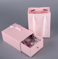 Nouveau design Boîte d'emballage en papier cosmétique de haute qualité Boîte cadeau de parfum bowknot avec sac en papier