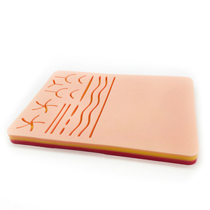 Coussin d'entraînement à la suture en silicone réutilisable Fitin avec 3 couches de peau, de graisse et de muscle pour les étudiants en médecine, les infirmières, les médecins, la pratique chirurgicale - Product Image 1