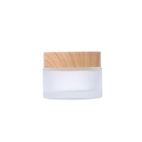 Pot cosmétique givré en verre de crème de visage de beurre corporel de l'usine chinoise personnalisé 5g 10g 15g 30g 50g 100g avec couvercle en bambou