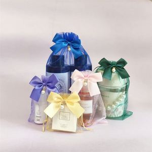 Customized Logo Printed PVC Organza Bag with Pearl <b>Bow</b> for Cosmetics Storage & Wedding <b>Gift</b> Pouch - Product Image 3