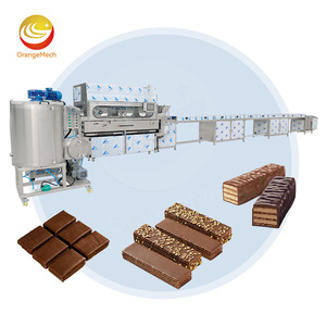 Chaîne de production ORME pour l'enrobage <span class=keywords><strong>au</strong></span> <span class=keywords><strong>chocolat</strong></span> des donuts, croissants, biscuits <span class=keywords><strong>et</strong></span> gâteaux, avec tunnel de refroidissement - Product Image 1