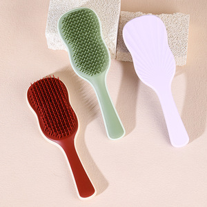 Individueller Logo Kunststoff Bananenblatt-förmiger Entwirrungs-Haarbürste Nass- und Trockenmassage-Haarbürste - Product Image 4