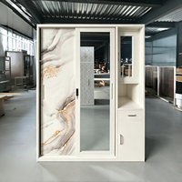 Armoire élégante en acier imprimé feuille de Ginkgo avec miroir et penderie, armoire métallique moderne à 2 portes coulissantes pour chambre à coucher