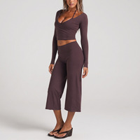 Ensemble de fitness décontracté pour femmes, vente en gros, haut court à manches longues, pantalon de yoga à jambes larges, vêtements de sport doux et respirants pour l'entraînement