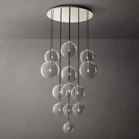 Lustre moderne en acier inoxydable avec globe en verre transparent pour salon, escalier, hôtel, décoration