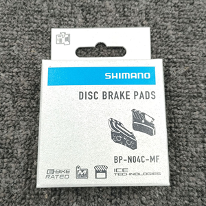 Pastillas de Freno de Disco Metálicas Originales <span class=keywords><strong>Shimano</strong></span> N04C Compatibles con XTR M9120 <span class=keywords><strong>XT</strong></span> <span class=keywords><strong>M8120</strong></span> SLX M7120 de 4 Pistones para Bicicletas de Montaña y E-MTB de Descenso - Product Image 1