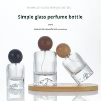 Iceberg série verre épais vide bouteille or pompe pulvérisateur Simple Design de mode pour parfum voyage recharge boîte pour la vente en gros