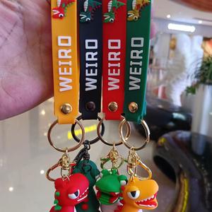 Nueva venta al por mayor dinosaurio muñeca llavero gota bolsa de plástico coche colgante bolsa dibujos animados colgante llavero - Product Image 4