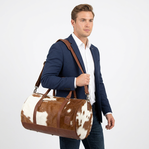 Bolso ovalado de piel de vaca, color marrón y blanco, correa para el hombro de cuero auténtico, cierre con cremallera, capacidad de 20-36L, mochila de viaje para hombre - Product Image 1