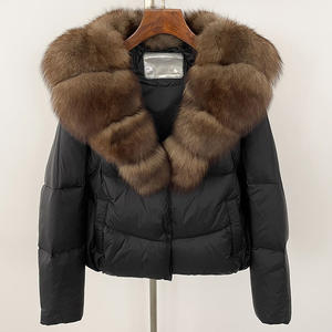 Женский пуховик с натуральным меховым воротником - Product Image 1