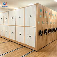 Système de rangement mobile industriel moderne en acier pour charges lourdes, compact, pour archives, avec armoire à roulettes pour hôpitaux et écoles