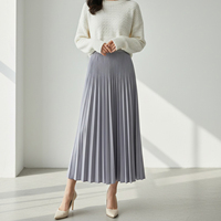 Vente en gros d'usine, jupe mi-longue plissée en jacquard décontractée et respirante pour femmes, été, plissée en trois dimensions