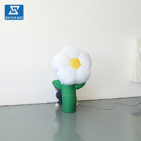 Modèle de fleur gonflable blanc sur pied personnalisé pour la décoration de paysages extérieurs, de scènes événementielles et de lieux touristiques