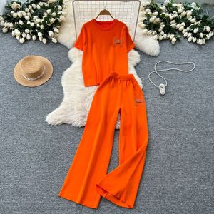 <strong>Women's</strong> Solid Casual Two Piece Pants Set <strong>Short</strong> Sleeve Top and Wide Leg <strong>Trousers</strong> with Metal Decor Elegant Loungewear Suit - Product Image 2