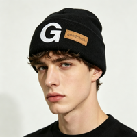 Bonnet tricoté uni d'hiver 2027 en gros, personnalisable avec logo brodé, 60 couleurs, par le fabricant de bonnets chauds