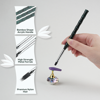 Nouvel ensemble professionnel de 7 pinceaux à ongles en acrylique vert foncé scintillant avec manche en forme de bambou anti-chute pour la peinture au gel UV