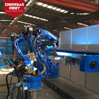Station de travail robotisée de soudage à 6 axes haute efficacité, modèle double robot haute précision pour les lignes de soudage de tuyaux et de structures en acier