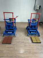 La machine de briques de ponte mobile 2-45 qui se vend bien en Guinée, achetez et recevez une petite machine de fabrication de blocs de chariot élévateur