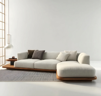 Canapé d'angle modulable de luxe moderne en tissu écologique capitonné pour salon de villa