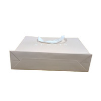 Sac de cadeau d'emballage de shopping en papier au détail de luxe personnalisé mini emballage de luxe sac en papier imprimé avec poignée avec logos