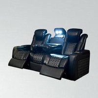 Canapé électrique de luxe en cuir avec surpiqûres diamantées, appui-tête réglable et éclairage d'ambiance LED pour salle de cinéma de villa