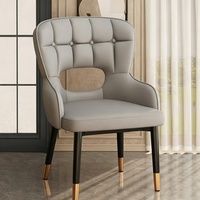 Fauteuil ergonomique moderne avec dossier creux et rembourré, chaise de salle à manger à dossier haut pour hôtel, villa, maison d'hôtes et restaurant