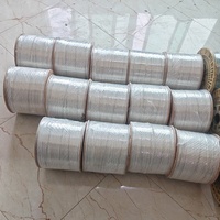 Venta Directa de Fábrica: Cable de Fibra Óptica para Exteriores G657A2 de 1.0mm 0.45mm/0.4mm, Cable de Bajada FTTH de 1F, 2KM/Rollo en Caja, Cubierta LSZH/PVC, Garantía de 5 Años