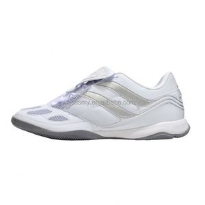 Botas de fútbol FG/TF al por mayor OEM/ODM para adultos y jóvenes, con opciones antideslizantes, ligeras y transpirables de tejido. - Product Image 2