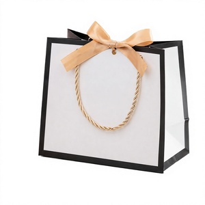 Biodegradable Handmade Durable Custom Logo Wedding <b>Gift</b> Paper Bags with Twisted Handles and Ribbon for <b>Small</b> Orders Souvenirs - Product Image 2