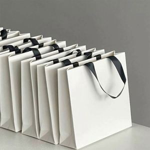 Custom Luxury Modern Gold Foil UV Printed Matte Embossed Laminated Sturdy Paper White Gift Logo <b>Large</b> Medium Clothing Store Bag - Product Image 3